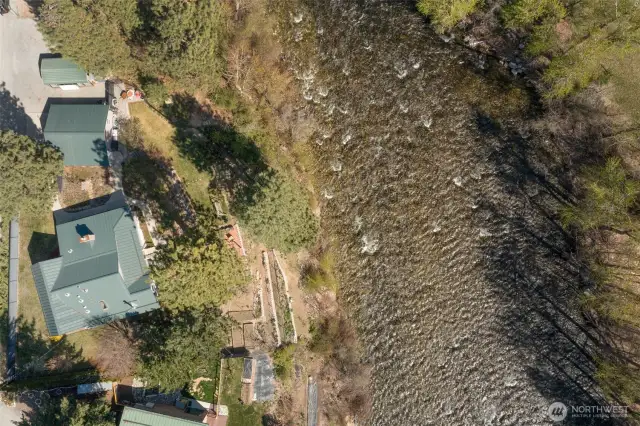 Aerial from above...looking down on home, garage, and carport.