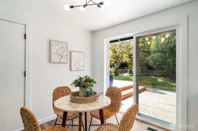 Sliding glass door takes you to private backyard complete with 2 decks!