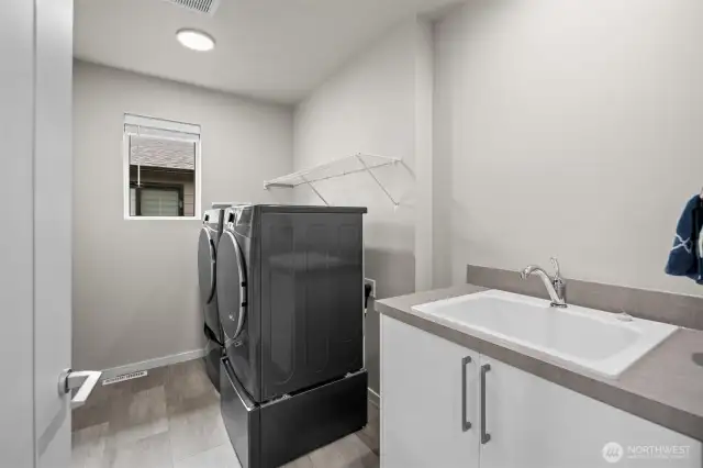 Upstairs laundry conveniently located near all bedrooms