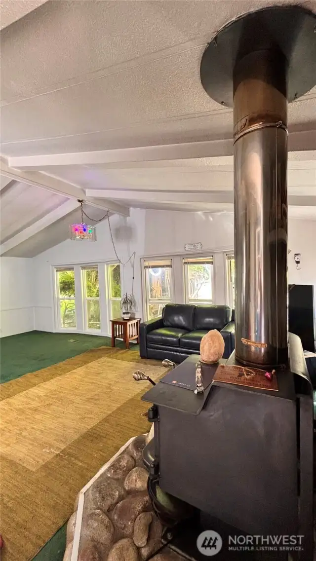 wood stove for cozy nights in your large living room space.