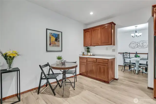 Kitchen with wood cabinets, lots of storage & eat in area.