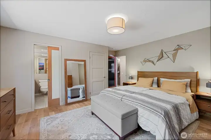 Primary on Main floor with attached 3/4 bath and two separate Walk In Closets.