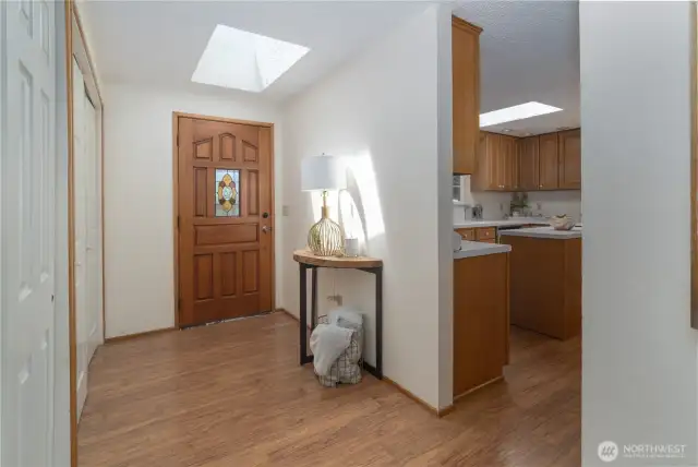 Welcoming entrance with skylights