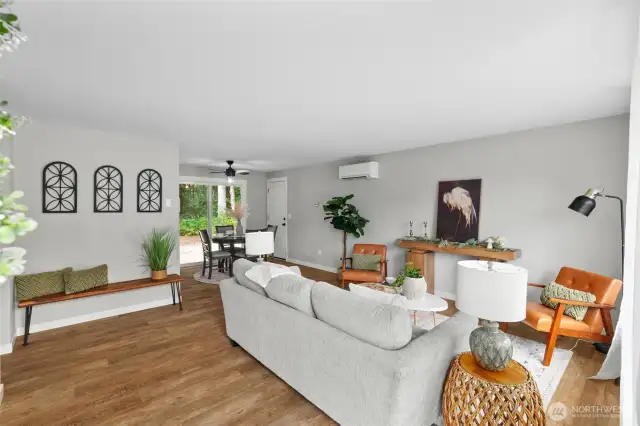 A ductless heat pump provides heat and A/C and a slider off the dining area opens to the ultra peaceful, private back yard.