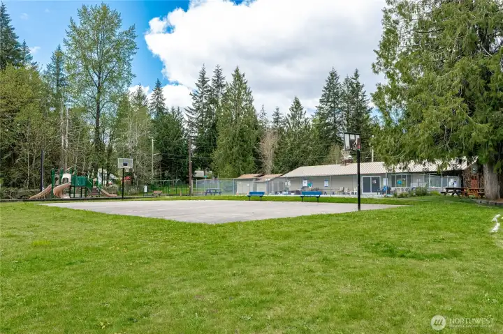 Evergreen Shores Beach Club is only open to home owners in this development. The 11 acre park includes the clubhouse, pool, play structure & swings, basketball court, playfield and more!