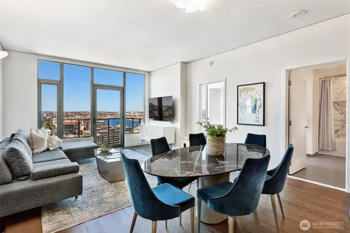 Walls of windows fill every inch of the space with abundant natural light year-round.