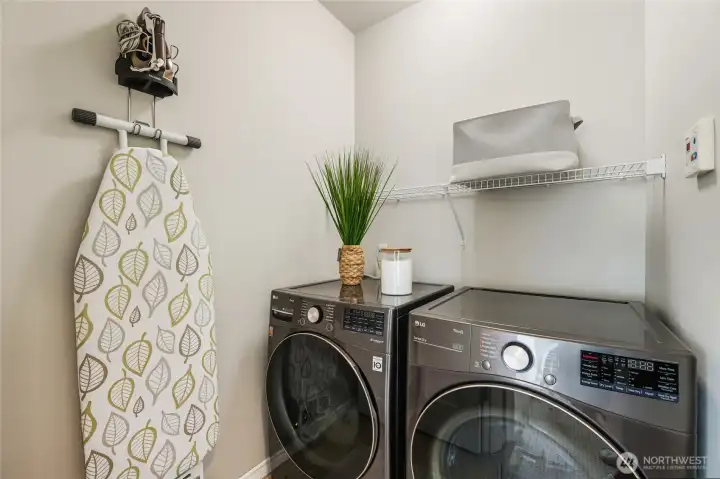 Well-appointed laundry room located upstairs