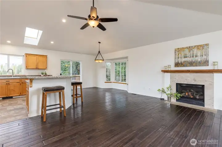 Bright and open main living area with vaulted ceilings. Fresh interior paint throughout!