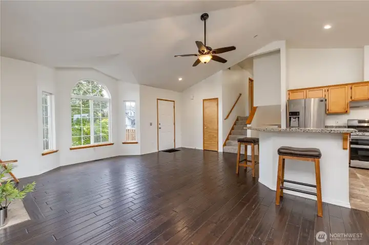 Open concept floor plan with hardwood floors