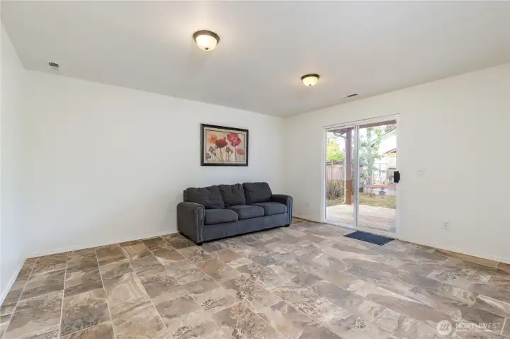 Lower level family room has slider to the covered back deck