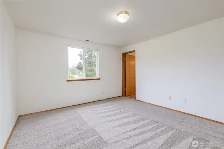 Primary bedroom has a private bath. Brand new carpets in all the bedrooms!
