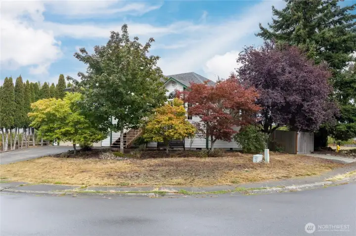 Large corner lot has mature trees for great privacy