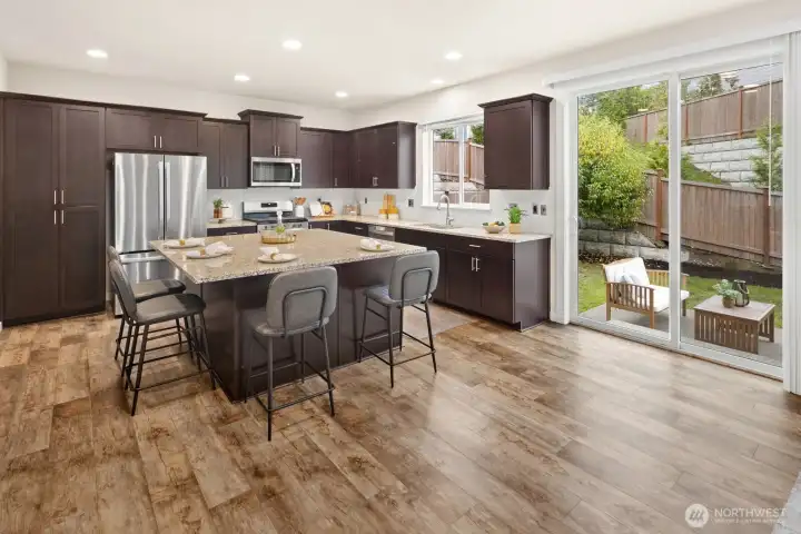 Expansive open kitchen. Granite & S/S Applainces