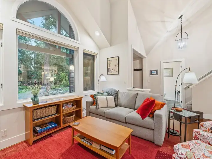 Cosy living room with forest views.