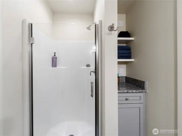 Studio 3/4 bath with linen storage