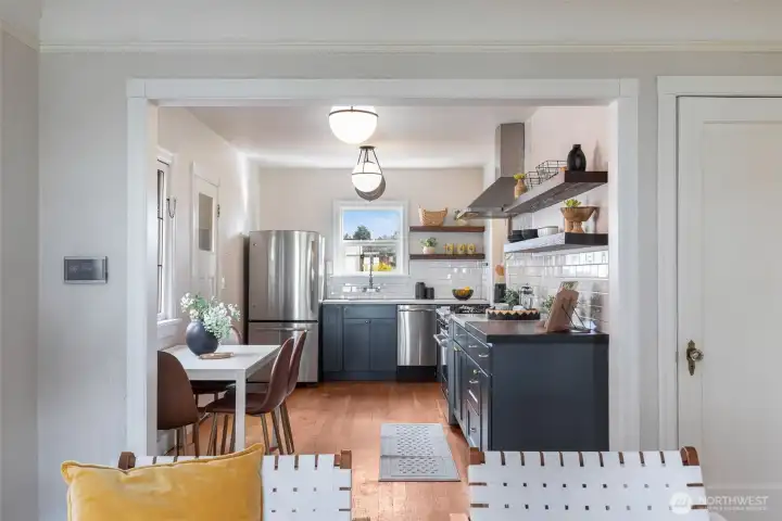 Gracious living room with lovely flow into kitchen.