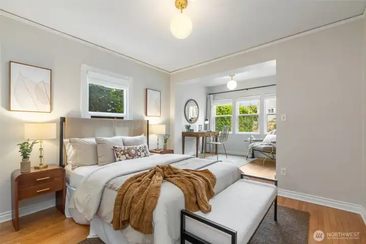 3 inviting bedrooms (2 on the main), including this primary with darling nook - perfect for a desk, a den, a nursery, a yoga space, or just reading a good book.