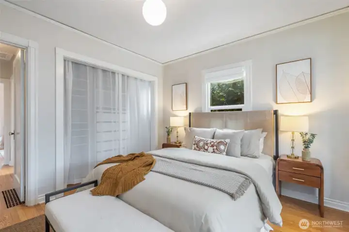 3 inviting bedrooms (2 on the main), including this primary with darling nook - perfrect for a desk, a den, a nursery, a yoga space, or just reading a good book.