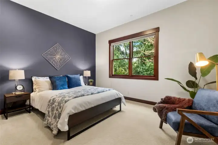 Two of three delightfully large main floor bedrooms!