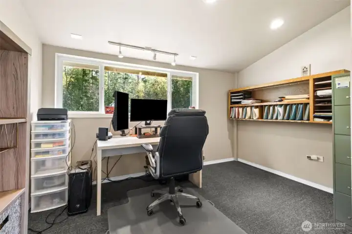 One of two private work stations in the upper level office in the shop.