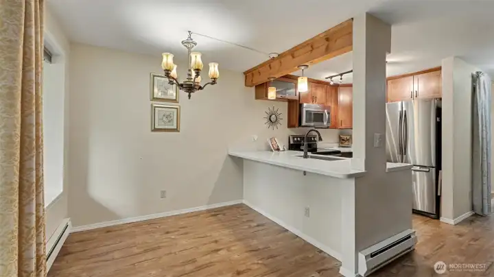 Enjoy a dedicated dining area or eat from the bar, and use this area as a den office!