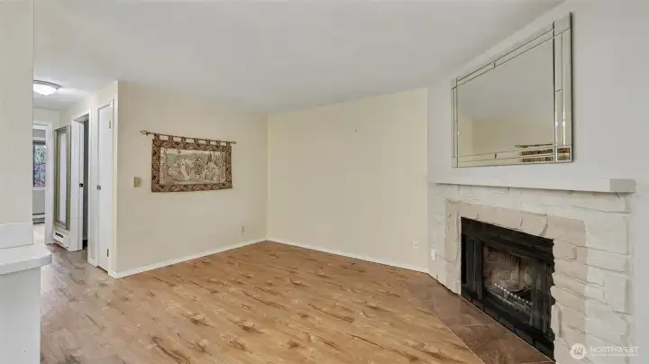 Center hallway leading to the bedroom, bathroom, laundry area and entryway.