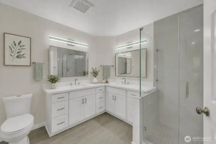 Beautifully updated  Primary Bath with quartz counters.