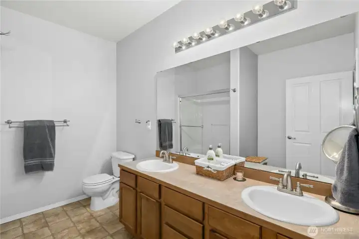 Primary bath with dual sinks.