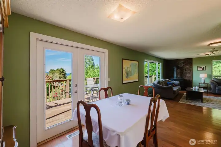 Dining room looking onto deck and living room