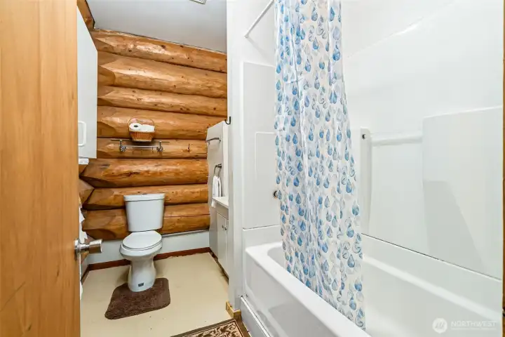 Full bathroom in pool hall building.