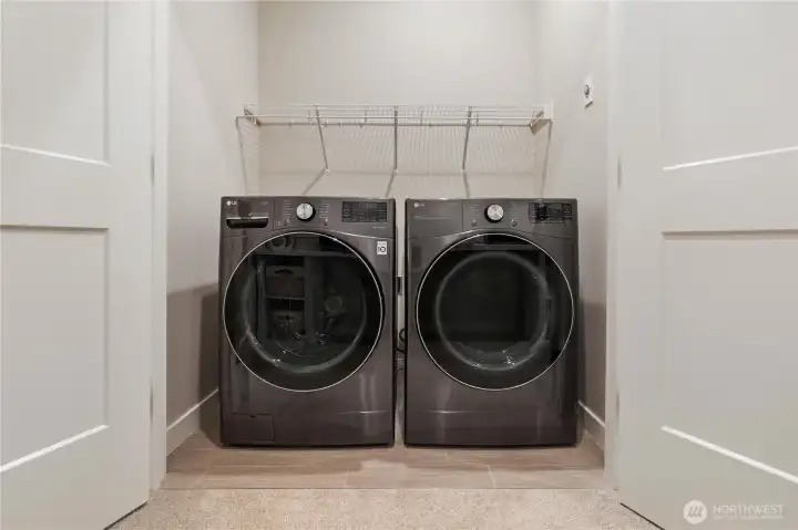 Added shelf in laundry room. Please note the Washer & Dryer are different units than what are shown in this photo. Added shelf in laundry room. Please note the Washer & Dryer are different units than what are shown in this photo.