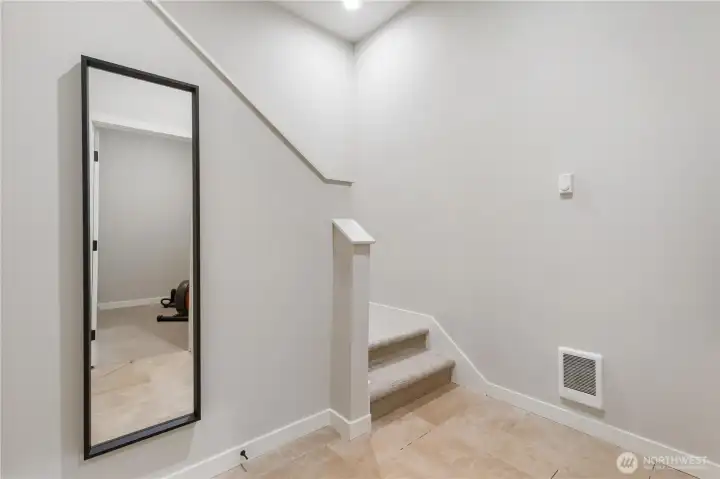 Lower level with access to 2 car garage and Bonus/Storage room Lower level with access to 2 car garage and Bonus/Storage room