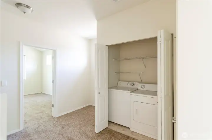 Washer and dryer are located on the upper level, making laundry easier to manage.