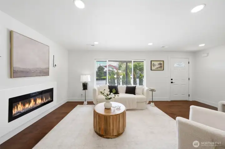 Beautiful Living area with fireplace and natural light from big window
