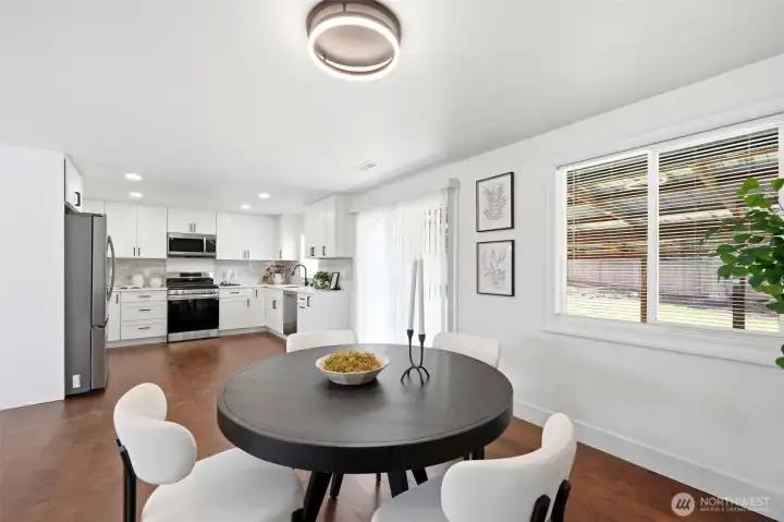 A spacious kitchen designed for gathering and dining.