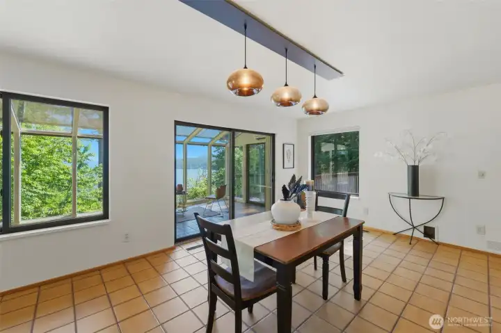 Dining room with slider to solarium