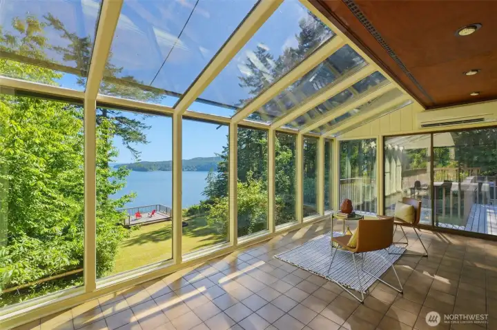 Floor to ceiling windows & ductless mini split in Solarium