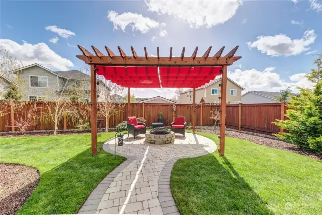 The Pergola, shade and screen absolutely enhance your ability to enjoy the back yard on the sunniest and rainiest of days!