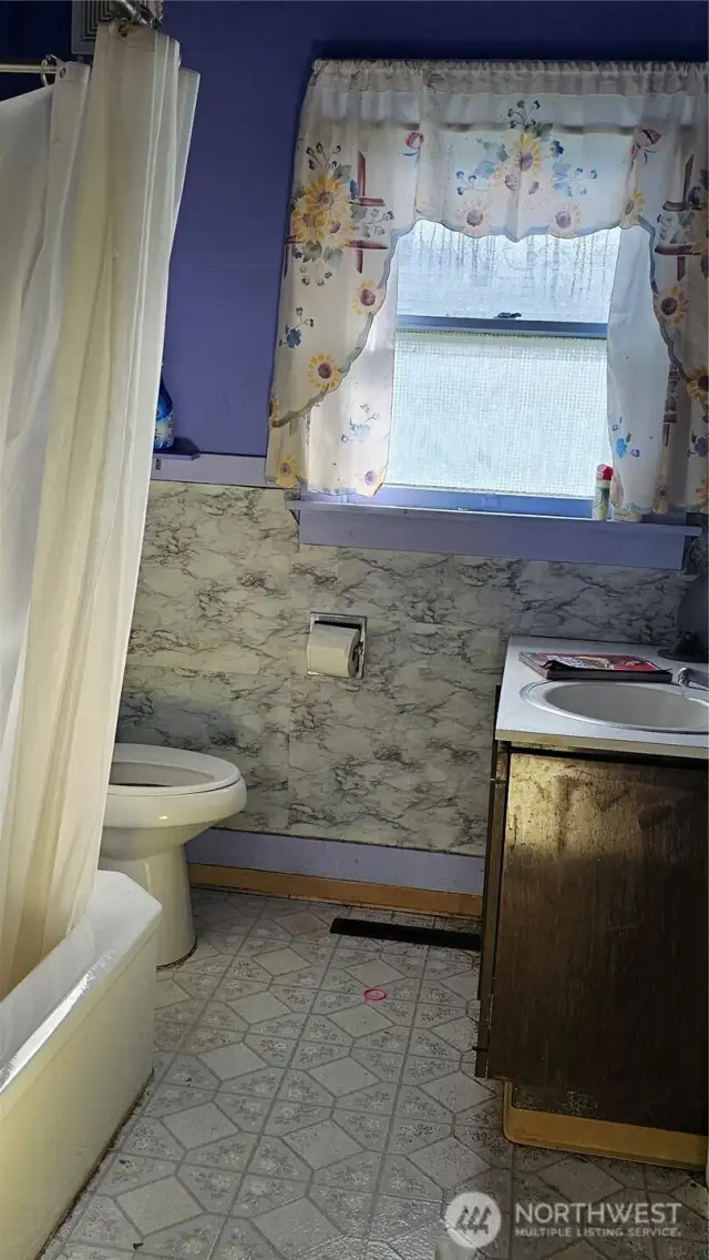 bath with tub and shower.