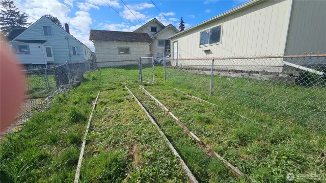 fenced dog run and garden areas