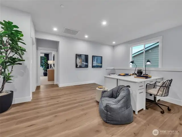 Light filled loft offers flexibility.  Photo is of model.  Elements in home can vary.