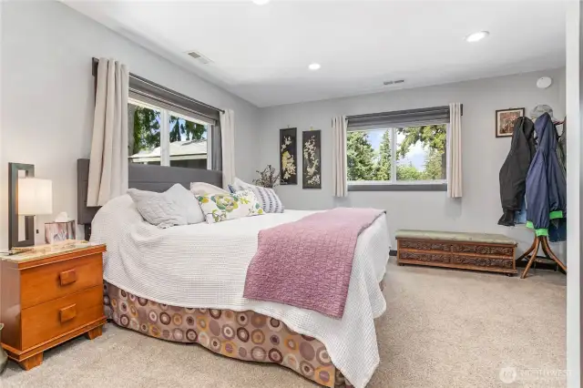 Primary bedroom offers space and tons of natural light