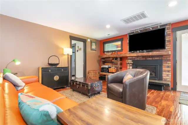 Gorgeous new mantle and engineered hardwood floors!