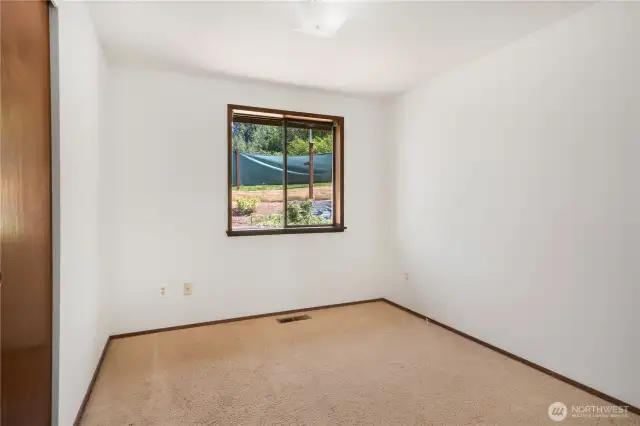 3rd bedroom, across from the bathroom.