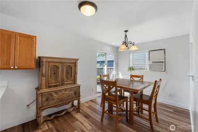 Dining area with slider to backyard deck