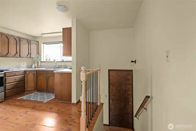 Back stairs lead you to back covered porch and down to the laundry room.
