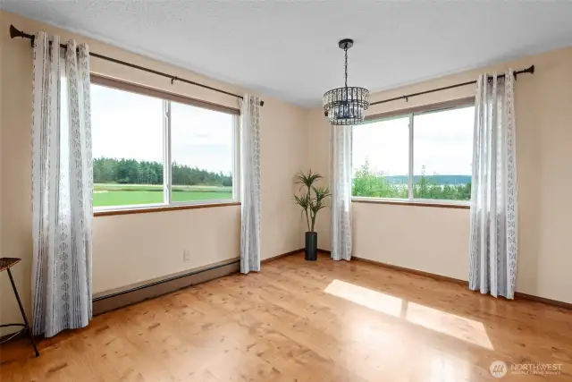 Farmland and Penn Cove views! An abundance of natural light!