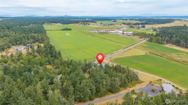 Aerial with views of the Cascade Mountains and Mt. Baker.
