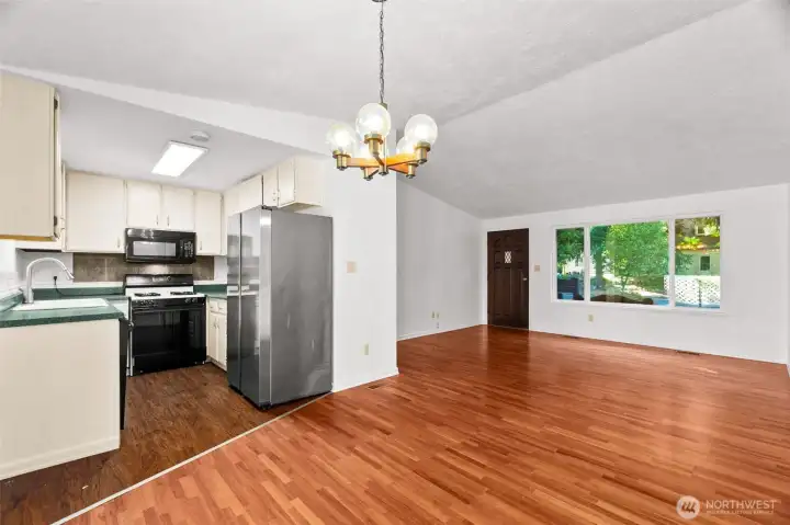 Kitchen, dining area, and living room blend seamlessly--what a great entertaining space!