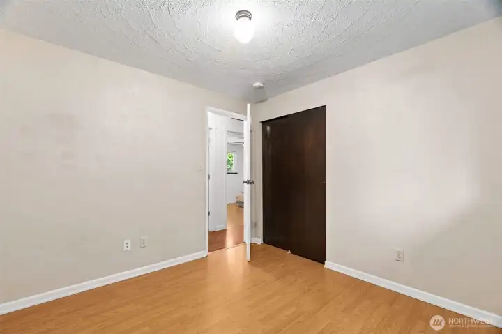 Third bedroom with view of closet in corner.